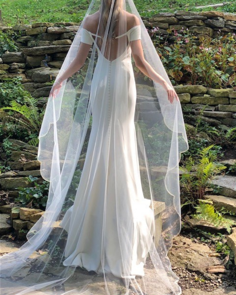 This veil is 108” wide and 108” long with a 5” gather at the comb. We are sending you images from our social media for you to share or print for your store display. The response to this veil has been tremendous. We love it because it is so versatile and appealing to so many types of brides and wedding gowns. We’re so happy that you choose this veil and we hope that you enjoy showing it, and even more when you’re writing up those orders!