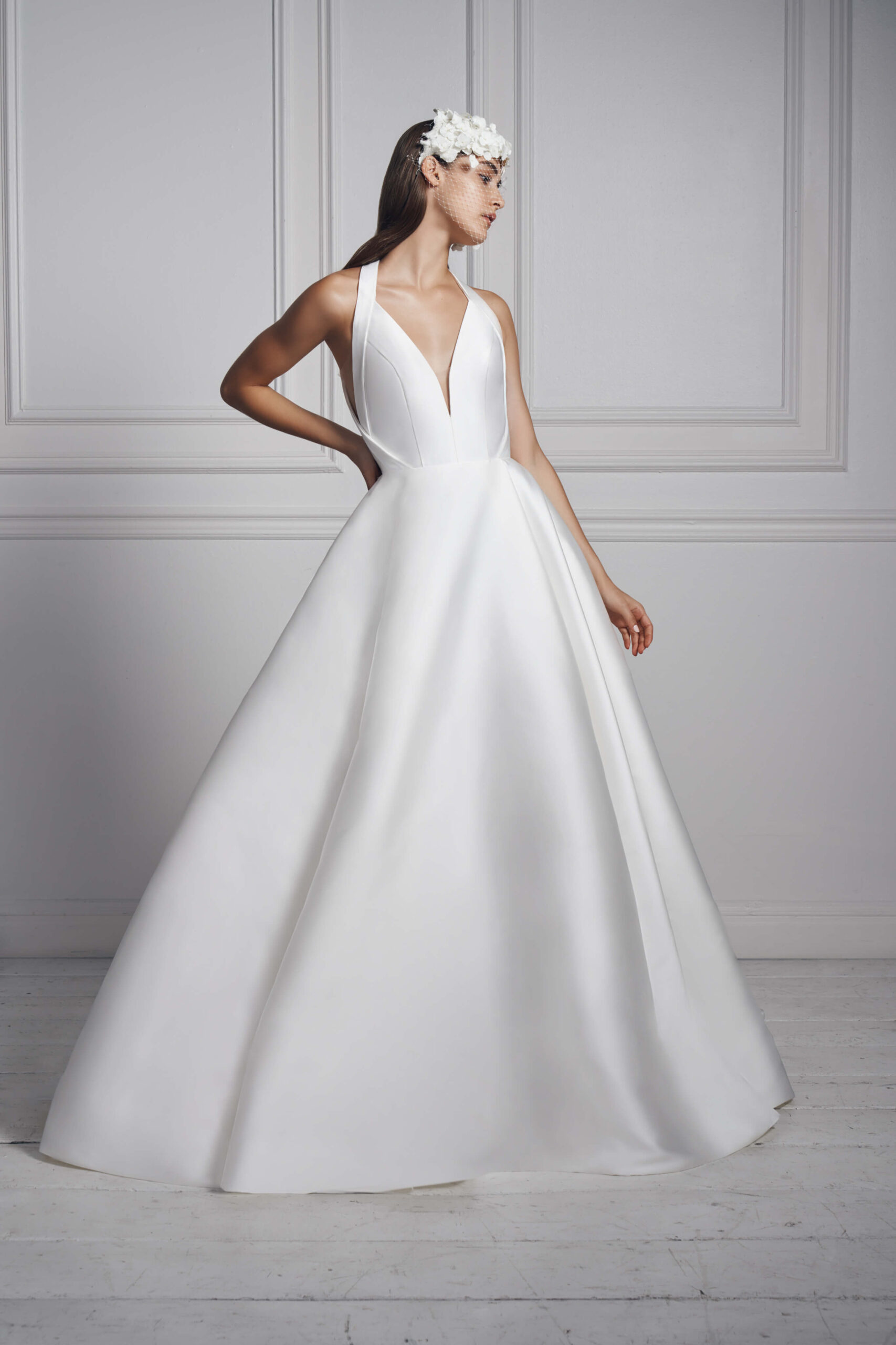 Plunging halter ball gown by Anne Barge.