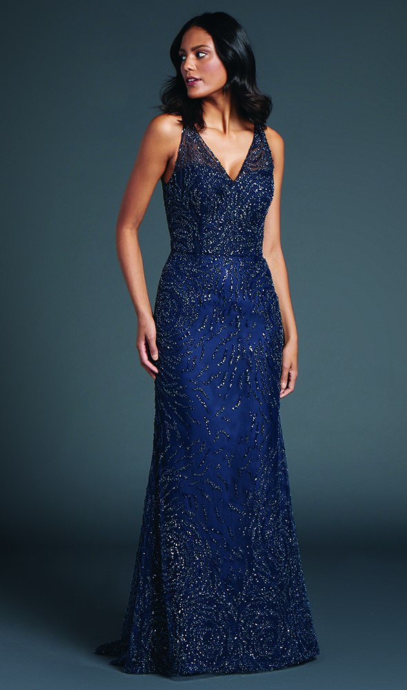 Introducing All-star. A plunging V-neck column gown of beaded embroidered tulle.