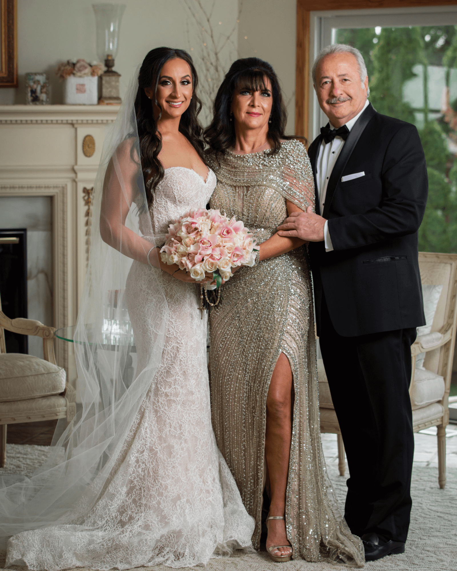 Bride standing with parents